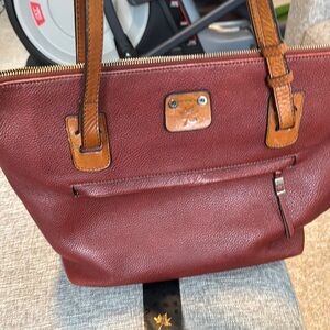 Red and Brown Leather Tote Bag with Gold Emblem